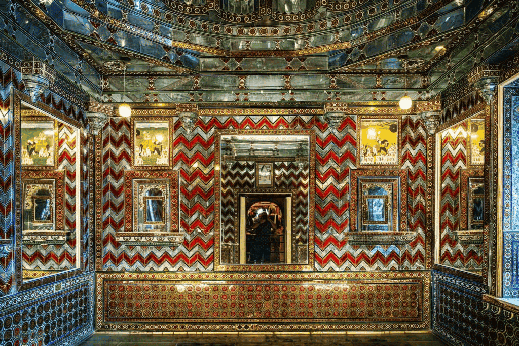 Sheesh Mahal at City Palace Udaipur. The glasswork and ruby work are done on the walls of the Sheesh Mahal.