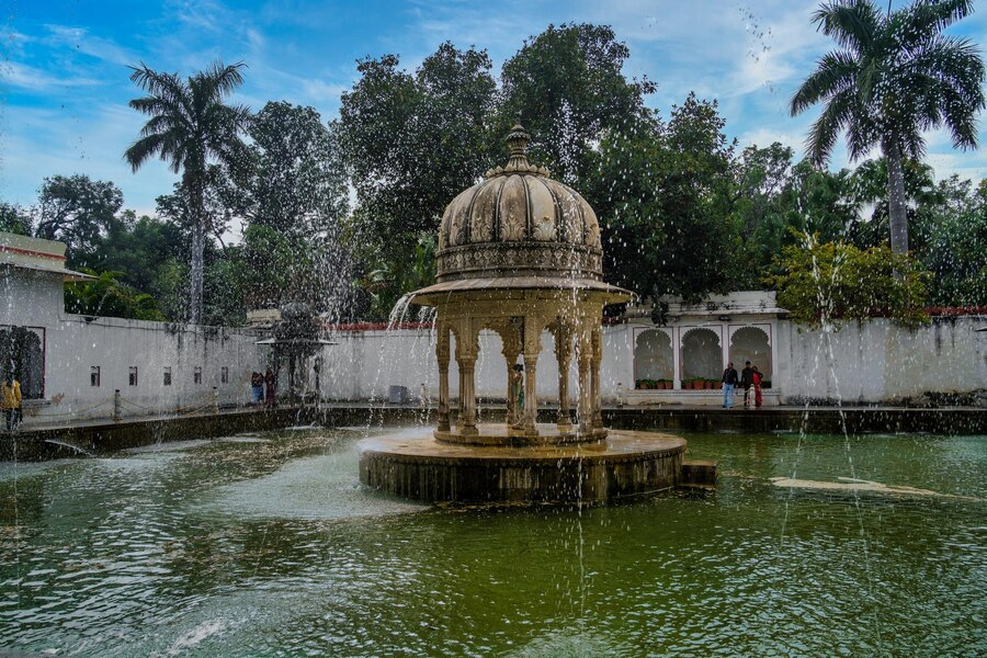 This is Bin Badal Barsat Pool at Saheliyon Ki Bari Udaipur, where you can see rain 12 months of the year without a rainy season.