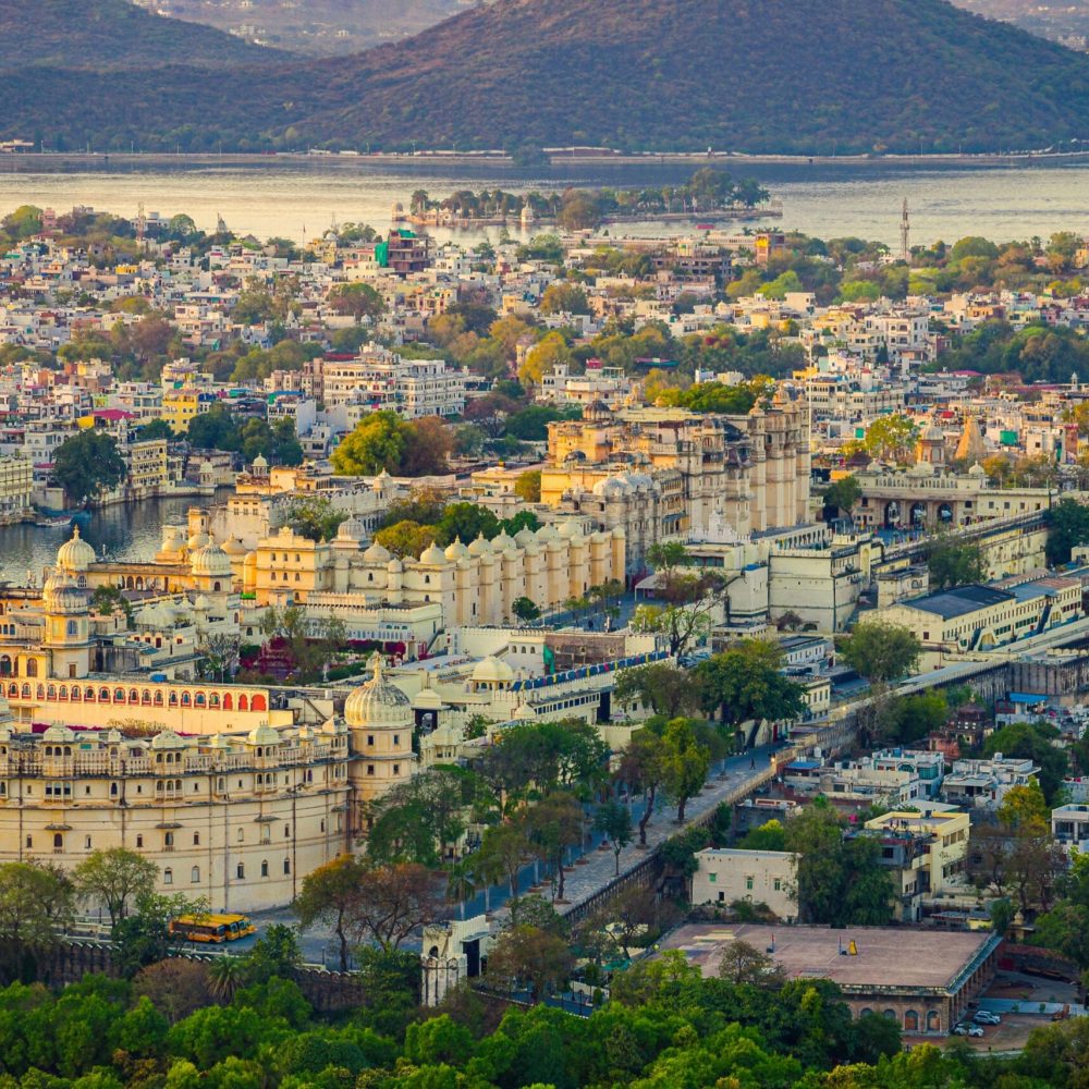 View of City Palace Udaipur and serene Lake Pichola.